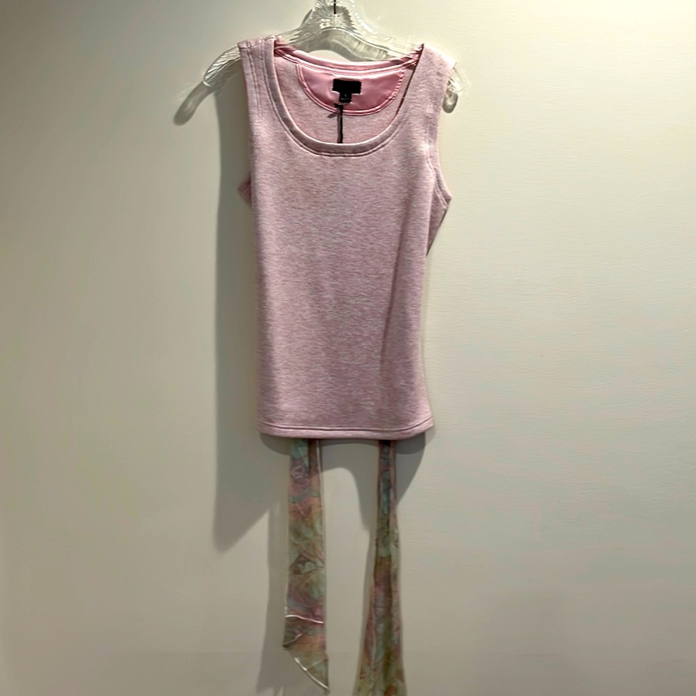 Two piece sweater set. Sleeveless shell under cropped zip front topper